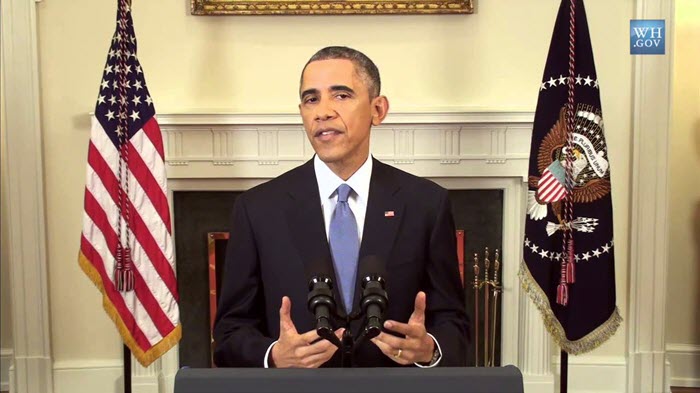 President Obama announcing a new policy toward Cuba